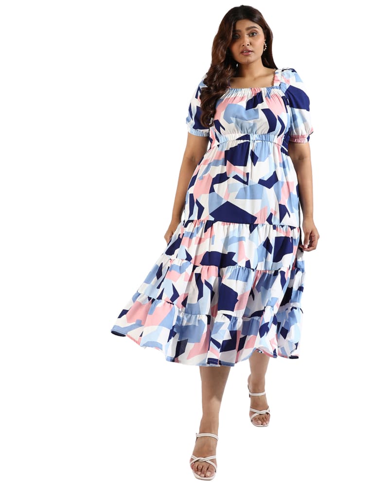 Front of a model wearing a size 5XL Women Graphic Design Casual Dresses in White by Instafab Plus. | dia_product_style_image_id:293739